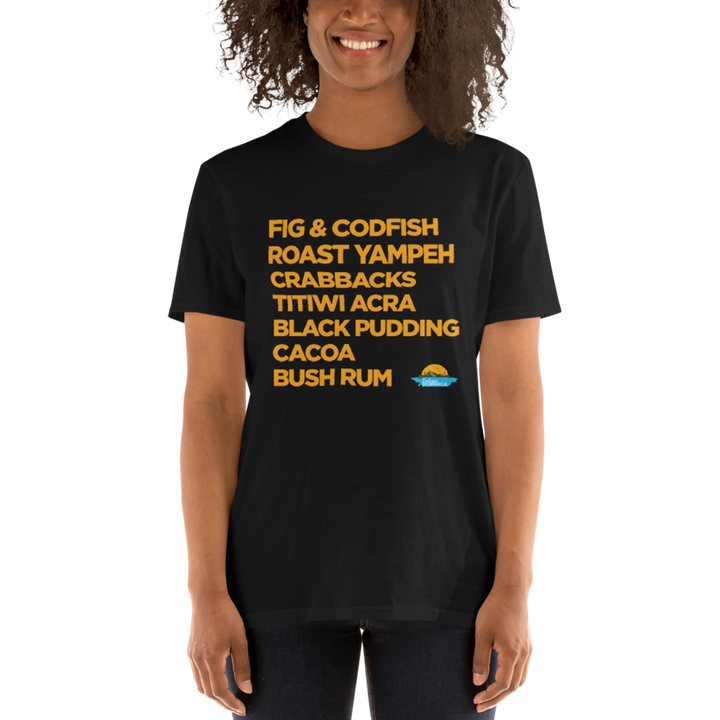 A brown skinned female model wearing a black "Good Eating #1" t-shirt with gold text, by Embrace Dominica