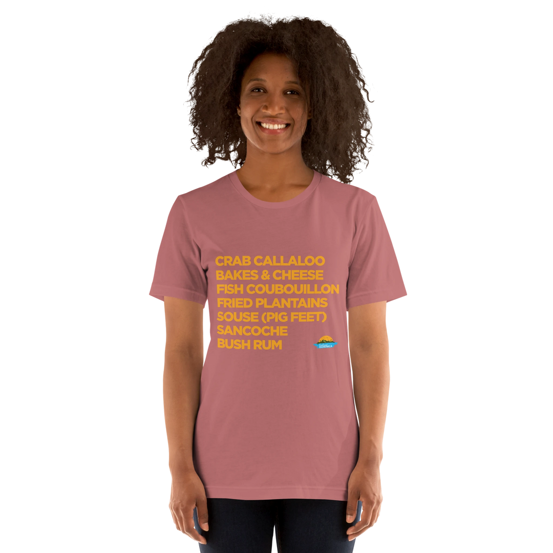 Brown skinned female model wearing a "Good Eating #2" mauve colored t-shirt, with gold text, by Embrace Dominica