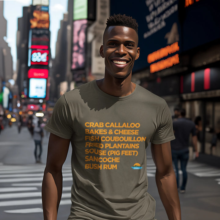 Dark skinned man wearing a "Good Eating #2" army colored t-shirt, with gold text, by Embrace Dominica
