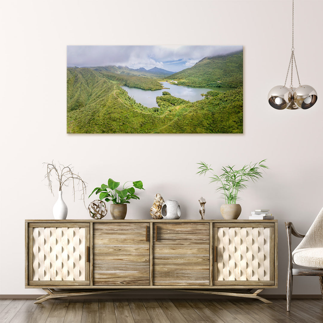 A canvas print of "FWL On The Trail #1" by Yuri A Jones, on a light colored wall, hung above a wooden desk.